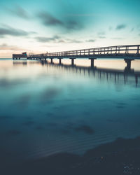 Bridge over river against sky