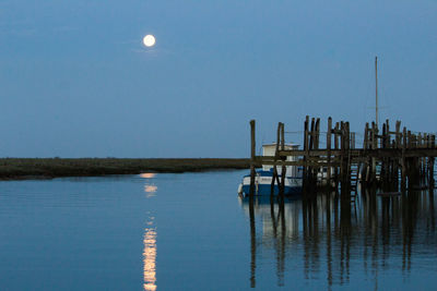 Moon reflection on calm waters