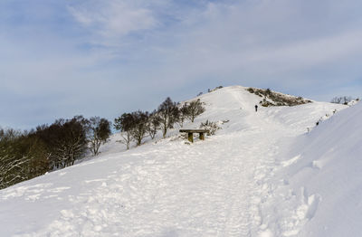 Scenic view of snow covered mountain against sky