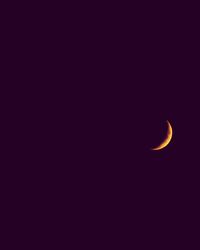 Close-up of moon against clear sky at night