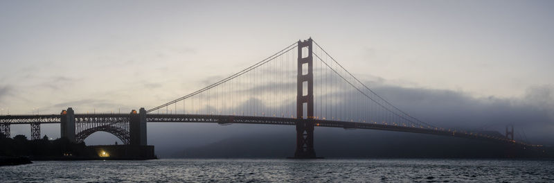 View of suspension bridge over river