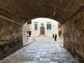 Archway leading towards buildings