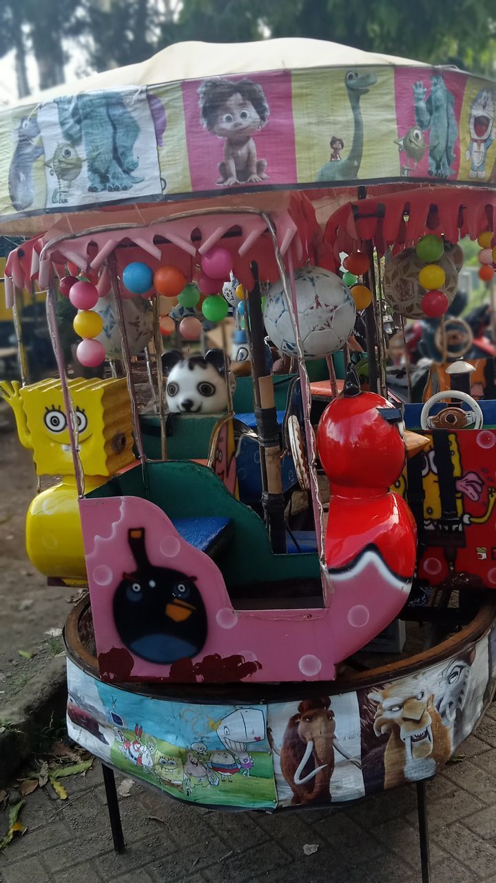 CLOSE-UP OF TOYS FOR SALE
