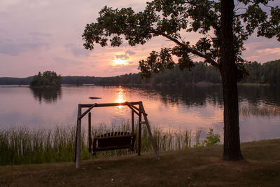 Scenic view of lake against sky during sunset