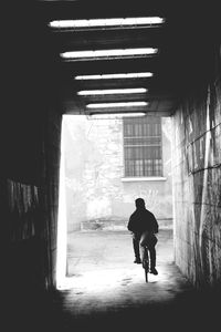 Full length of woman standing in building