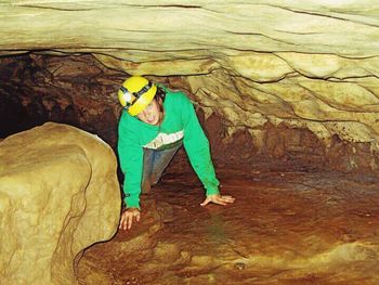 Full length of woman standing on wall