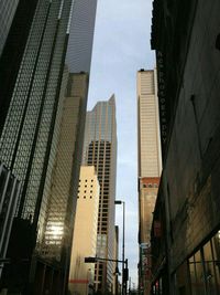 Low angle view of modern buildings against sky