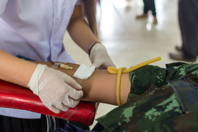 Cropped image of person during blood donation