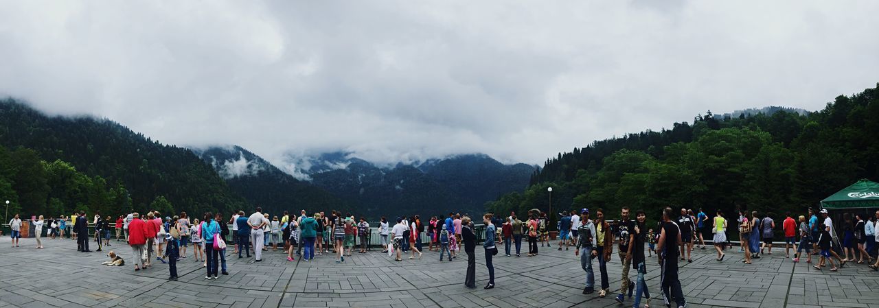 large group of people, sky, person, lifestyles, mountain, leisure activity, men, tree, cloud - sky, mixed age range, cloud, tourist, cloudy, vacations, crowd, walking, tourism, mountain range, day