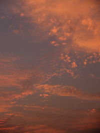 Low angle view of dramatic sky during sunset