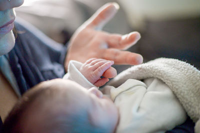 Close-up of mother holding baby