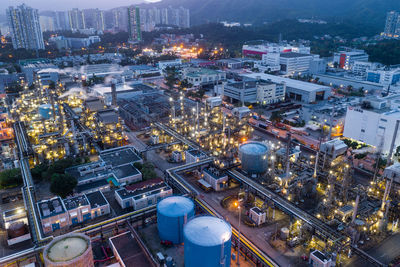 High angle view of illuminated buildings in city at night