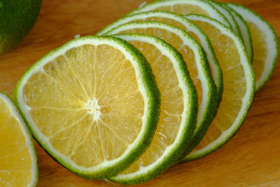 Close-up of lemon slice on table