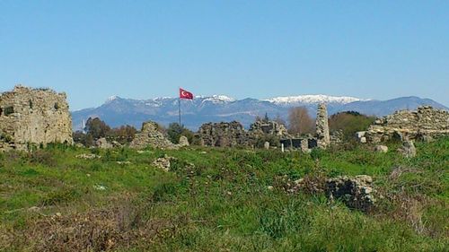 Landscape with mountain range in background
