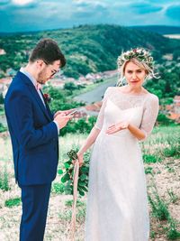 Young couple standing outdoors