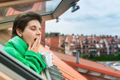 Portrait of boy looking away while sitting in car