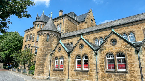 Low angle view of historic building against sky