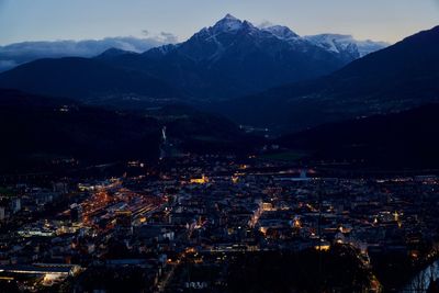 High angle view of illuminated buildings in city against sky