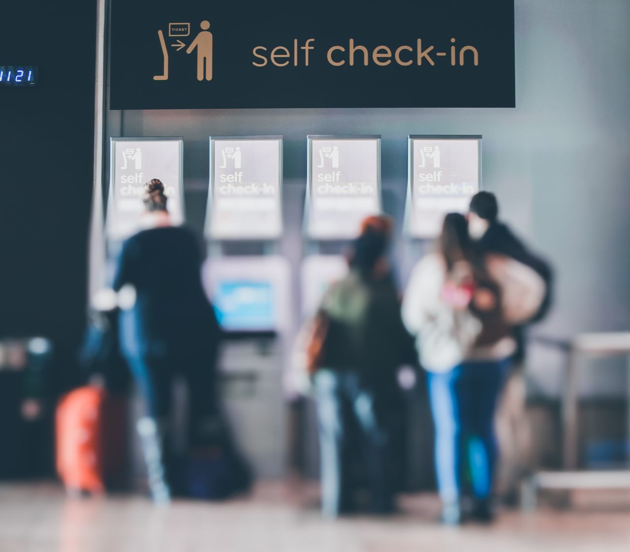 GROUP OF PEOPLE AT THE AIRPORT