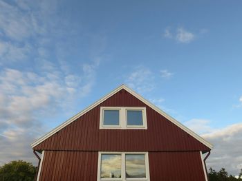 High section of building against cloudy sky