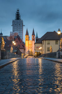 Illuminated buildings at waterfront