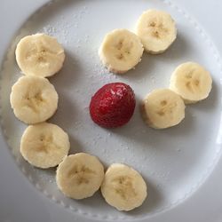 High angle view of fruits in plate on table