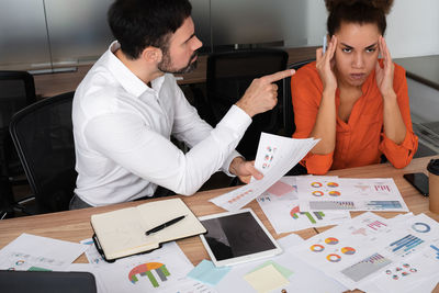 Business colleagues working at office