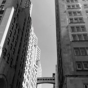 Low angle view of skyscrapers against sky