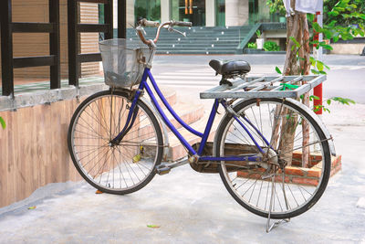 Bicycle parked on footpath in city