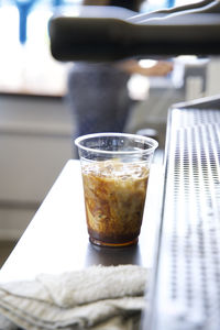Close-up of iced latte on the counter of a coffee shop in los angeles, ca
