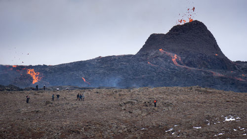 Scenic view of volcanic mountain against sky