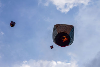 Low angle view of kite flying against sky