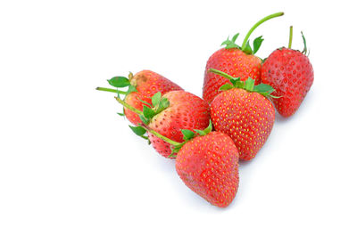 Close-up of strawberry over white background