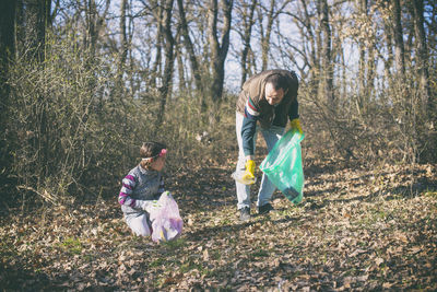 Full length of women in forest