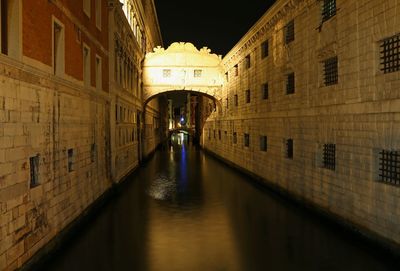 Reflection of illuminated buildings in water at night