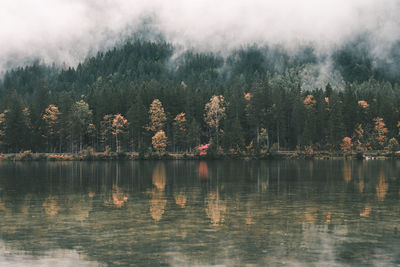 Scenic view of lake against sky during autumn