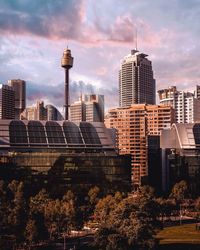 Modern buildings in city against sky