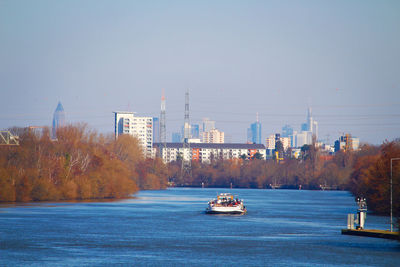 Scenic view of city against sky during autumn