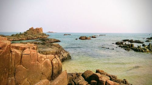 Scenic view of sea against clear sky