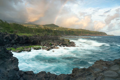 Scenic view of sea against sky during sunset