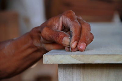 Man working on wood