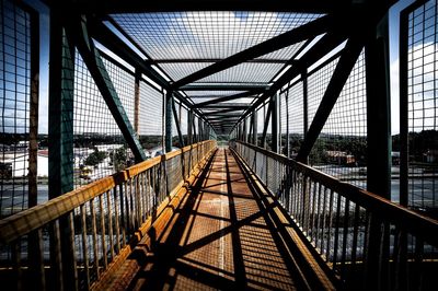 Footbridge against sky