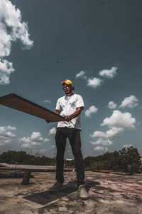 Full length of man standing against sky