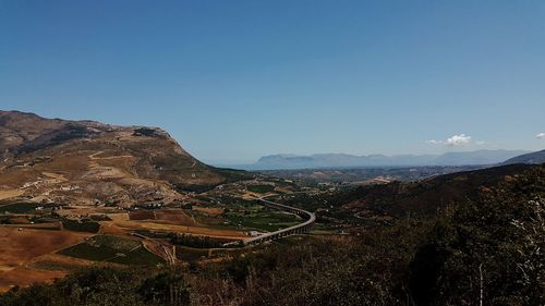 Scenic view of mountains against clear sky