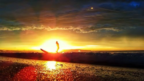 Scenic view of sunset over landscape