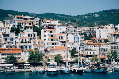 Boats moored at harbor