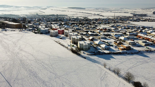 High angle view of snowy town