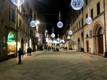 View of illuminated city at night