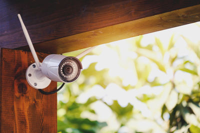 Close-up of security camera on table