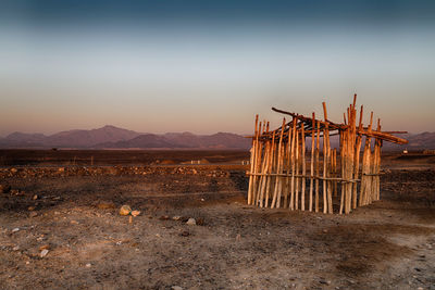 Built structure on land against sky